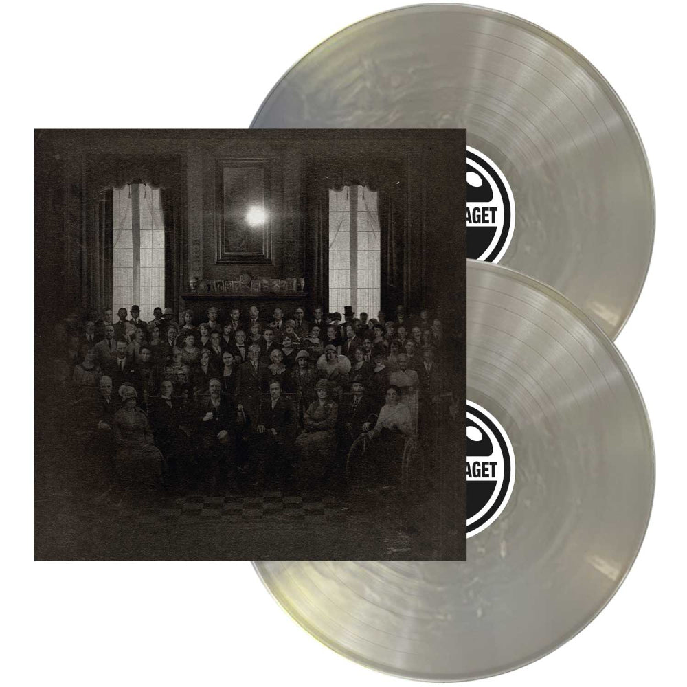 Two clear vinyl records with a black and white album cover featuring a group of people in a room.