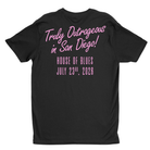 A black short-sleeve t-shirt shown from the back, featuring pink text that reads 'Truly Outrageous in San Diego! HOUSE OF BLUES JULY 23th, 2026' on a plain white background.